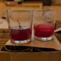 Glass Votive Holders And Red Candles