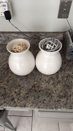 Two White Ceramic Vases