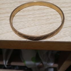 GOLD PLATED BRACELET. AND GOLD PLATED RING. GOOD CONDITION. SELLING BOTH FOR $25.DOLLARS.  