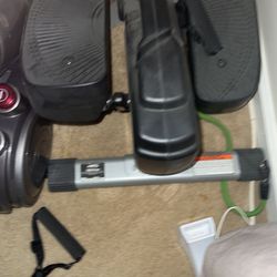 Elliptical trainer with resistance bands