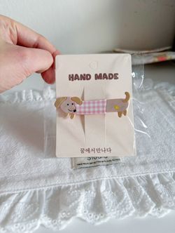 Cute dog with white and pink shirt hair clip 