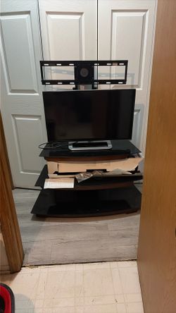 Tv Stand With Smart Tv And Speaker