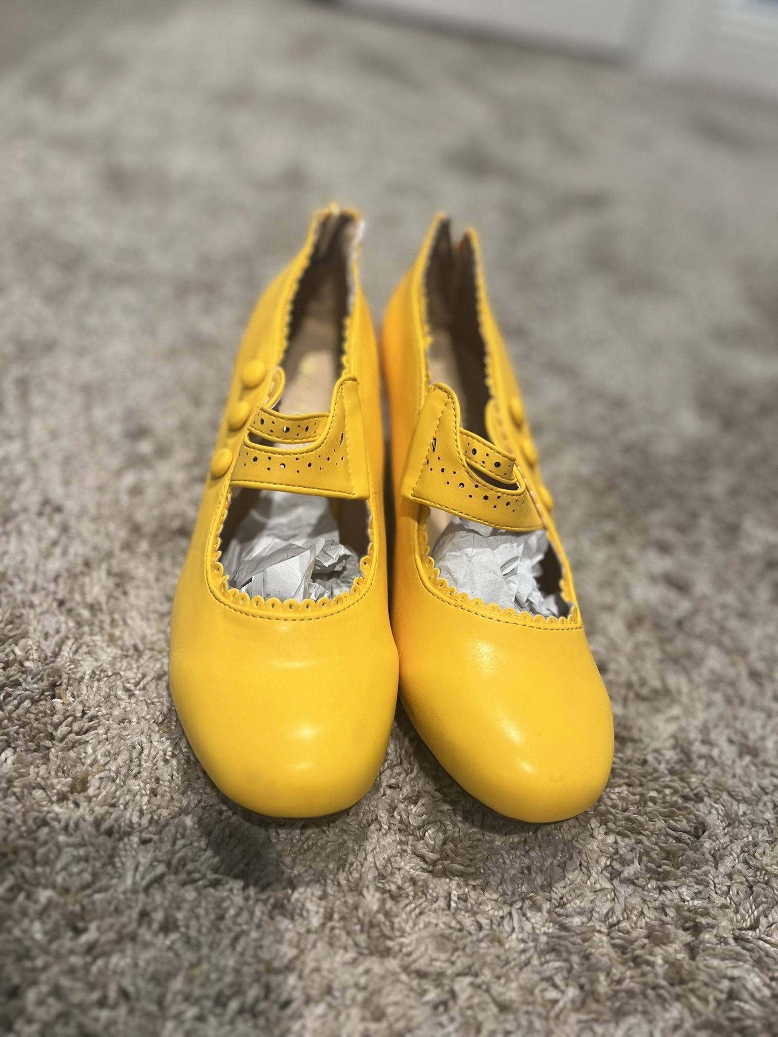 Yellow kitten heel pumps