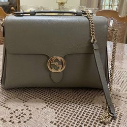 Authentic Gucci handbag Grey leather and Gold hardware