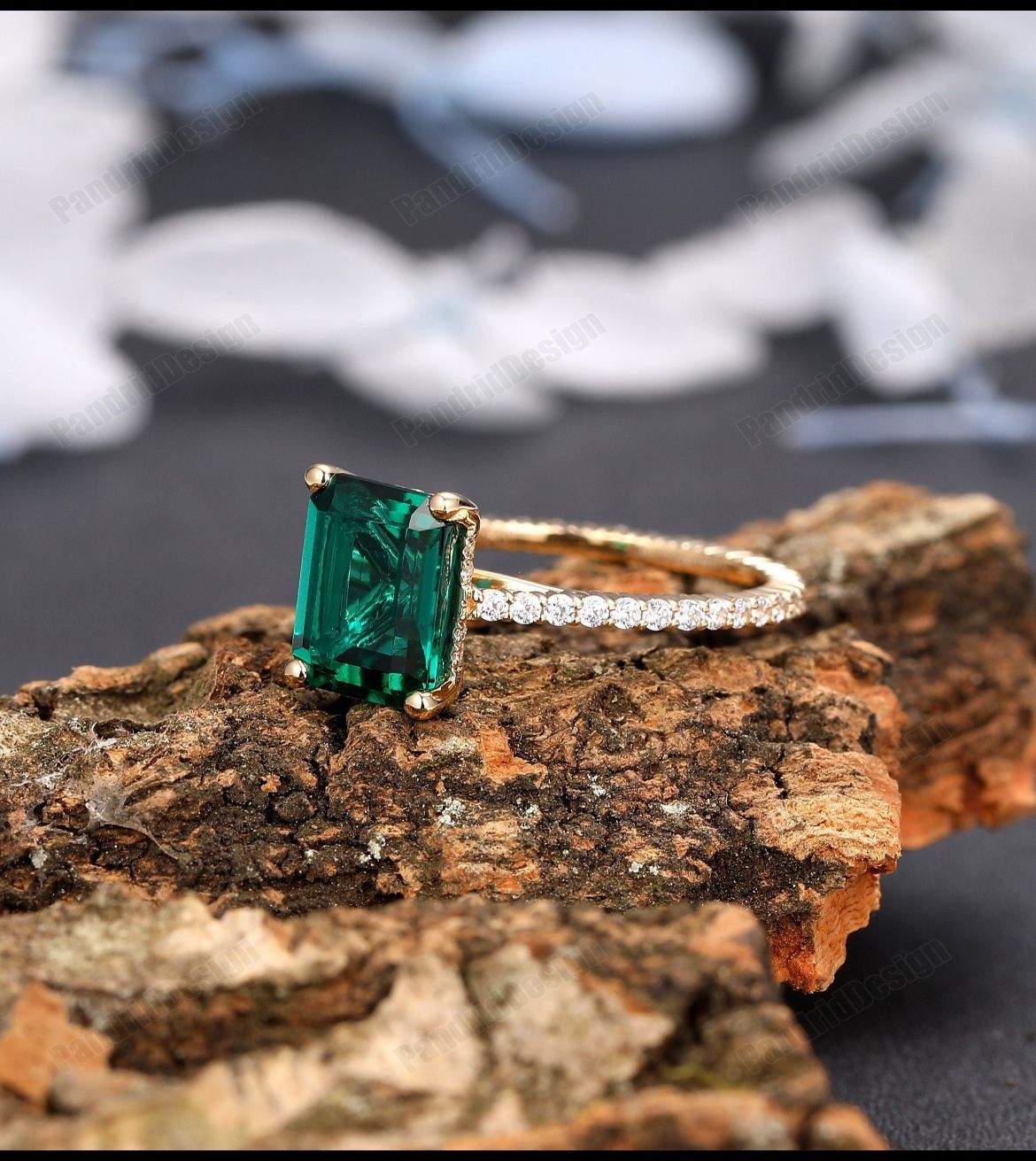 3 karate gold emerald cut engagement ring