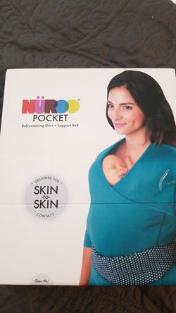 Nuroo Pocket Baby wearing Shirt