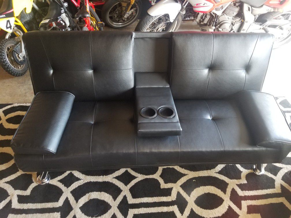 Black faux leather futon