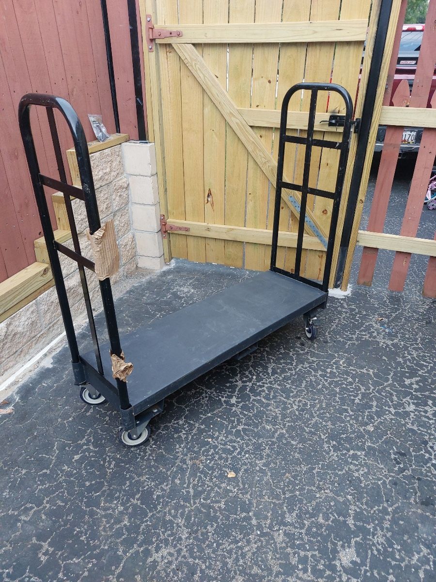 WeBuy • Used moving carts in good condition, 14 inches wide by 54 inches long, holds over 5,000 pou...