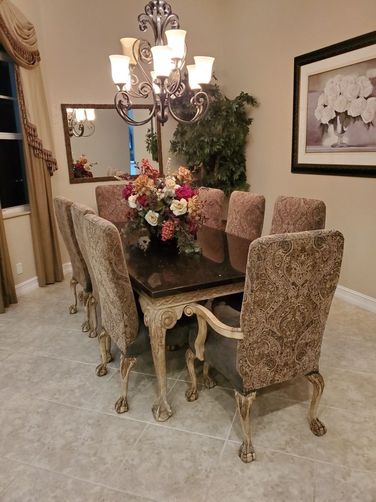 High end dining table with 8 chairs