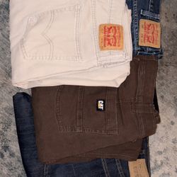 LOT of 4 Mens Jeans & Work Pants Levis 513 559 CAT Caterpillar Mixed Sizes