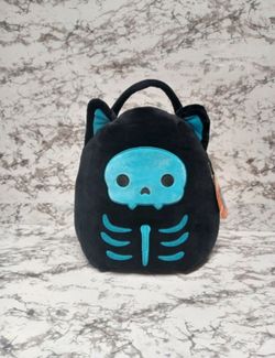 Squishmallows Stump the Skeleton Cat Treat Pail.