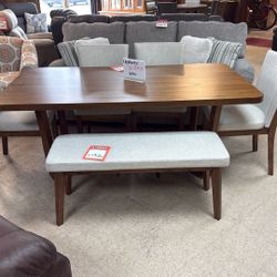 Brand new dinette and four chairs for $1000 bench for $200