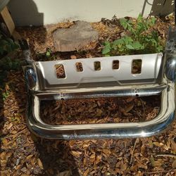 A Chrome grill bumper.
 Tacoma, Toyota, recommend 