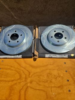Rear left and right slotted Vented Brake Rotors 2005 to 2014 Ford mustang $120 for pair brand new in box