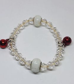 Christmas bracelet with acrylic clear and white beads an red bells