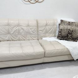 Beige leather couch and sofa