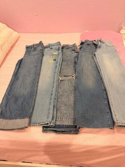 four pants and one pair of size 7 stitch shoes