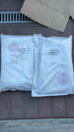 Selling 2 brand-new, factory-sealed DuPont Tychem 4000 SL heavy-duty chemical barrier coveralls.