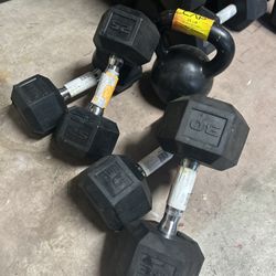 new pair of 25lb and 30lb rubber dumbbell with one 35lb kettlebell