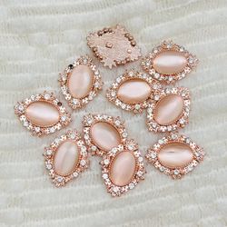 Rhinestone peach flat back button 