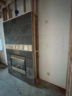 Gas fire place with pre build tile wall