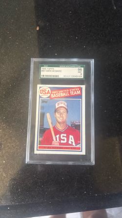 1985 Topps Mark McGwire #401 in a Mint 9 grade