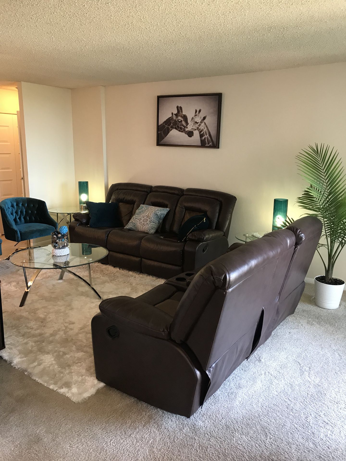 Two piece leather sofa with Recliner