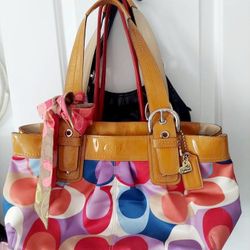 Colorful coach handbag in mint condition.