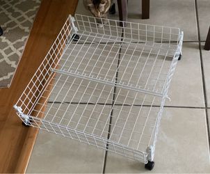 Under bed storage on wheels