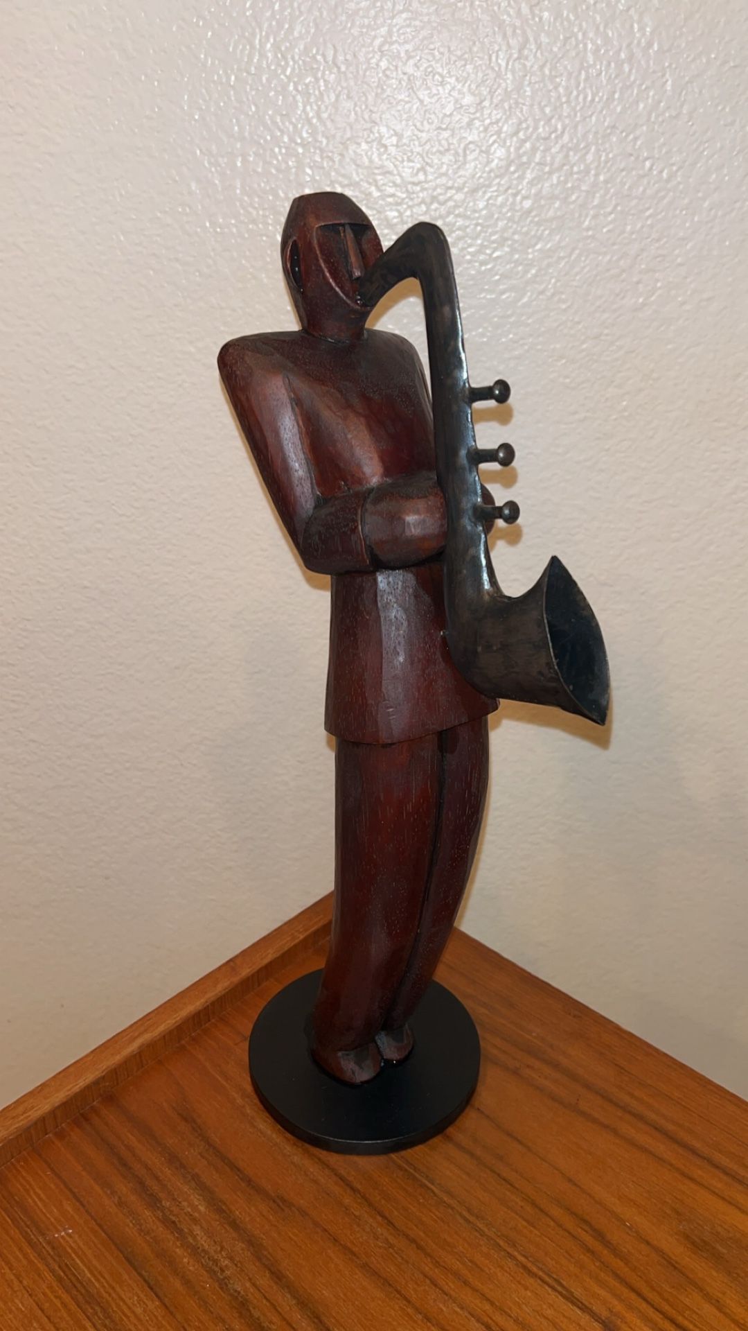 Guy playing a Saxophone