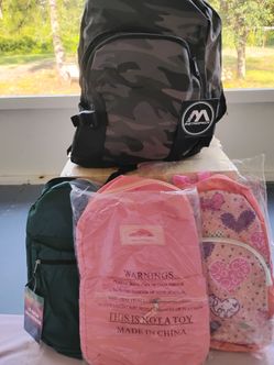 A group of 4  new Backpacks Nee