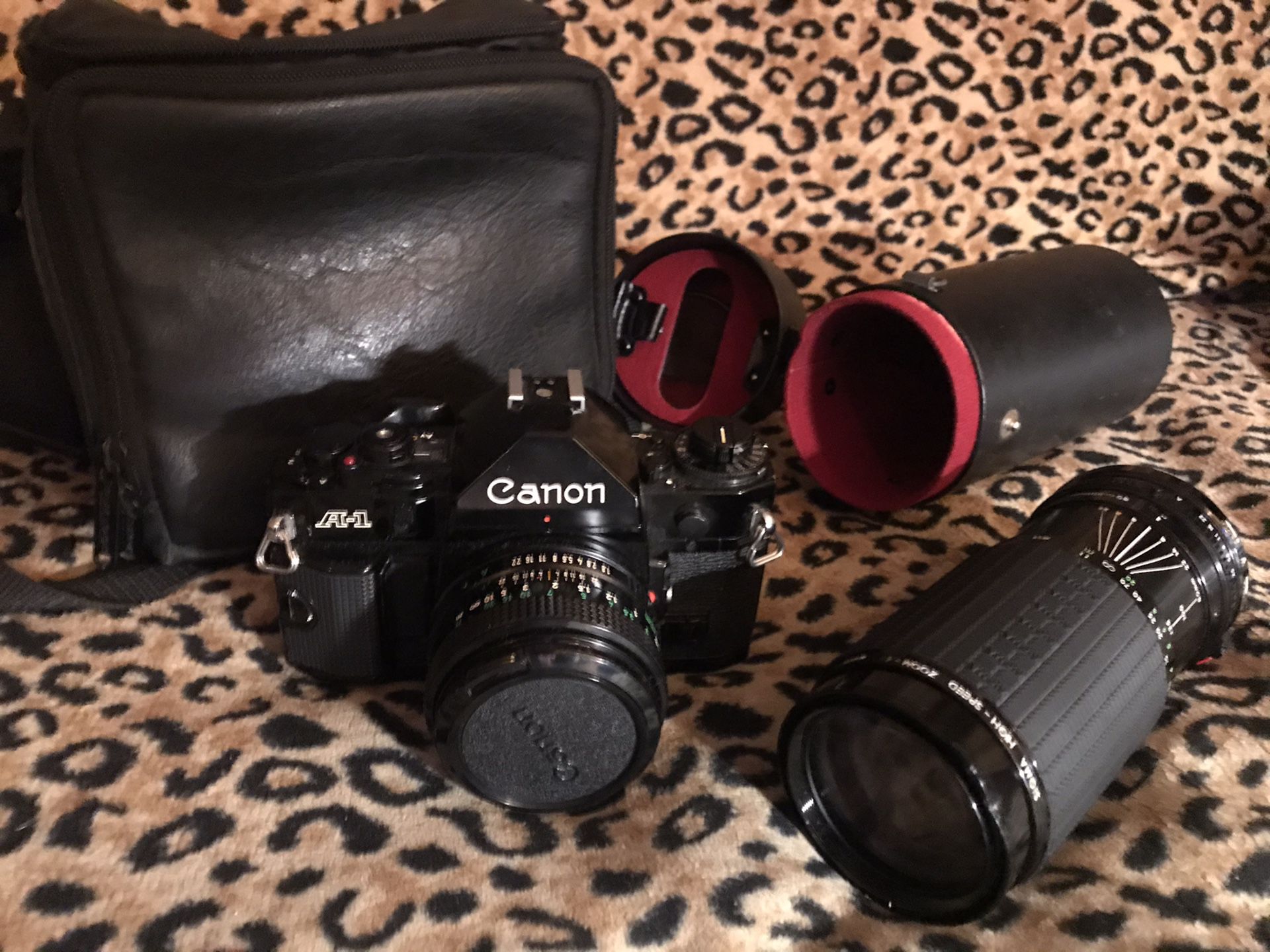 Canon A1 Professional Camera with auto high speed lense, filters and carrying cases