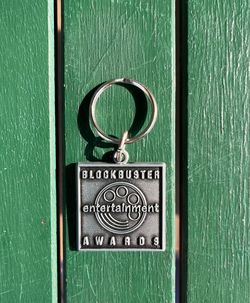 Vintage 1990s Blockbuster Entertainment Awards keychain, pewter key ring