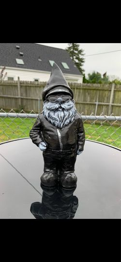 The senior biker gnome statue