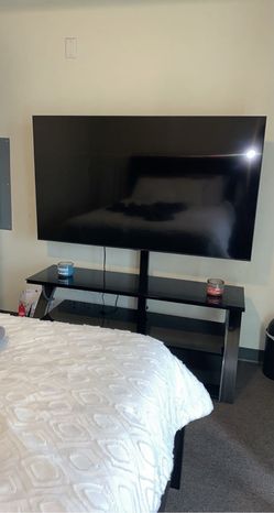 Black Glass TV Stand with Integrated Mount