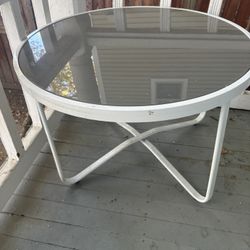 Metal base glass top table