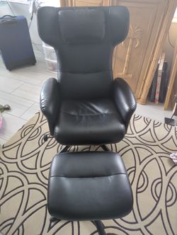 Comfortable reclining chair with footrest