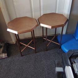 A Set Of Metal Side Tables 