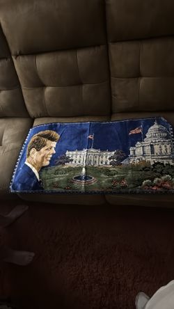 JFK tapestry.