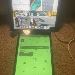 Two Apple iPads One Is 9 Gen  Air Pods And Stylus Pen 