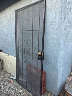 Black Metal Security Screen Door with Scrollwork