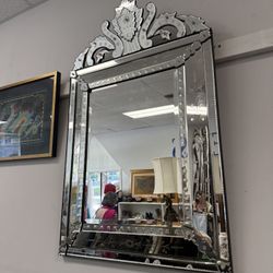 Large Venetian style glass mirror with etched scrollwork 