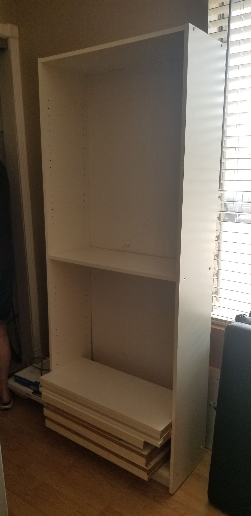 Great condition white shelf units 6 ft. High 30 inches wide 12 inches deep ,have 2 shelve units