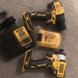 Brushless Dewalt 20 V drill and impact battery and charger Brand New