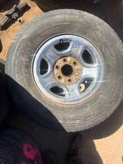 2001 Chevy 16 in wheel with tire