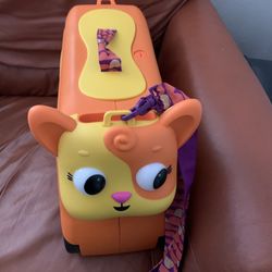 B. Toys Battat Cat Ride On Luggage 