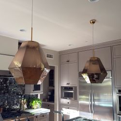 Two large Tom Dixon pendants