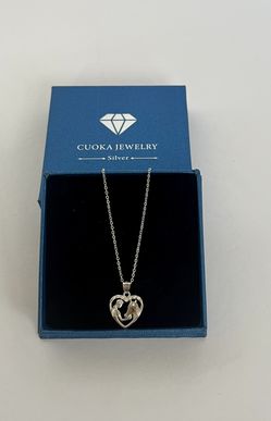 Cuoka Hore & Girl silver necklace