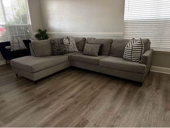 Light gray L shape sectional sofa