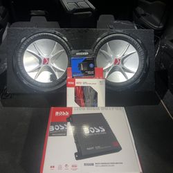 2 12’ Kicker Subs In An Enclosed Box